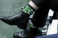 Deputy Prime Minister and dual citizen Barnaby Joyce shows off his sheep socks, during question time in March.