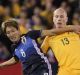 Aaron Mooy of Australia and Genki Haraguchi of Japan contests possession during last year's World Cup qualifier game  at ...