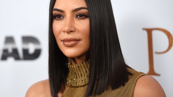 FILE - In this April 12, 2017, file photo, Kim Kardashian West arrives at the U.S. premiere of "The Promise" at the TCL Chinese Theatre in Los Angeles. Kardashian West was trending on social media after defending makeup artist Jeffree Star as an asset to her cosmetics empire despite his history of racist remarks and calling her fans âpettyâ for bringing up his past. Kardashian West said in a Snapchat video Tuesday, Aug. 15, that sheâs sorry for âfeeling like I had the right to say âget over itâ in a situation that involves racism.â  (Photo by Chris Pizzello/Invision/AP, File)