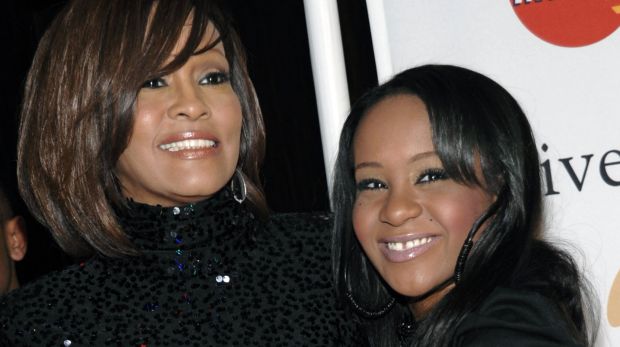 Singer Whitney Houston, left, with her daughter Bobbi Kristina Brown in 2011. 