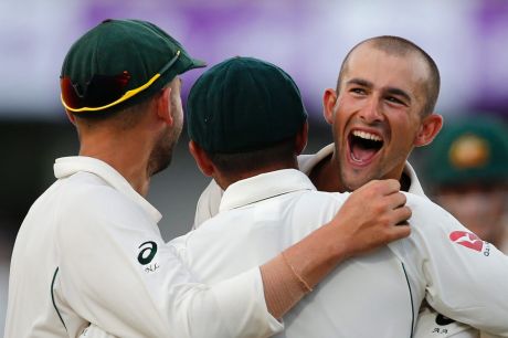 Australia's Ashton Agar, right, celebrates dismissing Bangladesh's Soumya Sarkar.