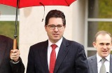 Macquarie Capital boss Robin Bishop, second from left, and colleagues leave the Department of Finance in Canberra.