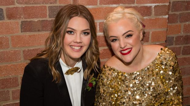  Brisbane couple Alex, 28, (left) and Lauren Fisher, 33, at their wedding in 2016. They plan to have another ceremony if ...