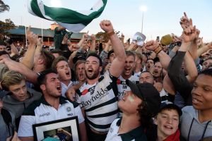 Alive and well: Warringah players and fans celebrate.