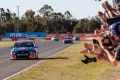 Craig Lowndes racing at the Queensland Raceway at Ipswich. The circuit is set to stay in the Supercars series until 2028.