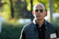 Busy life: Jeff Bezos runs the world's biggest retailer, owns The Washington Post and aerospace company Blue Origin. 