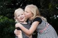 Evie Weir, 6, who is fighting cancer, with her sister, Alicia, 8 in Sydney.