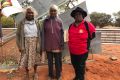 Shirley Wonyabong, Elizabeth Wonyabong, and Vicky Abdullah are protesting the development of uranium mines on their ...