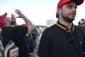 Protesters sporting a Fred Perry polo that they've adopted as their signature garment.