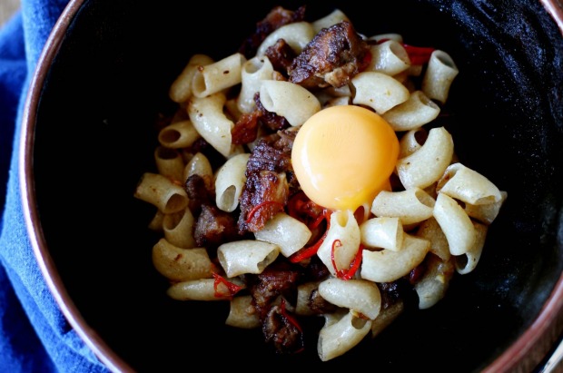 ACME's signature macaroni with pig's head and egg yolk.