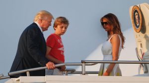 President Donald Trump, first lady Melania Trump and son Barron Trump board Air Force One at Morristown Municipal ...