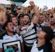 Alive and well: Warringah players and fans celebrate their Shute Shield success.