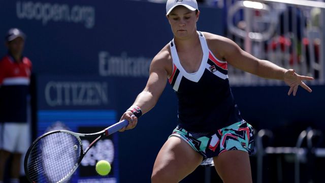 Ashleigh Barty, of Australia, returns a shot from Sloane Stephens, of the United States, during the third round of the ...