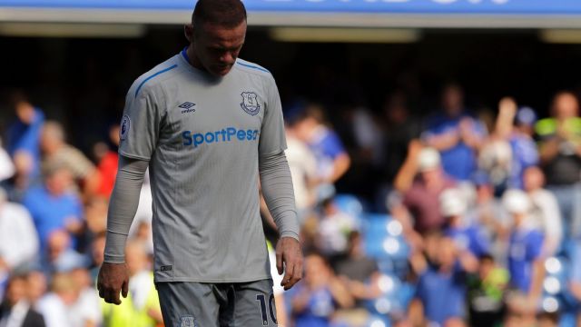 Everton's Wayne Rooney walks on the pitch at the end of the English Premier League soccer match between Chelsea and ...