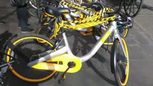 Pictures of oBikes wrapped in what appears to be City of Melbourne tape on Friday.