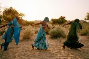 Women pull water from a well in the Thar desert, where temperatures hover between 48°C and 50°C on summer days.