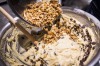 Stir in the choc chips and walnuts.