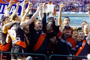 Bomber glory: Captain James Hird and coach Kevin Sheedy lift the 2000 AFL Premiership cup.