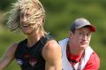 Dyson Heppell and John Worsfold during a training session.