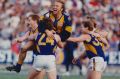 Eagle joy: Guy McKenna, John Worsfold and Chris Mainwaring after the 1992 grand final.