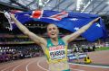 Australia's Sally Pearson celebrates after winning the gold medal in the women's 100m hurdles final.