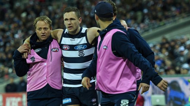 Joel Selwood helped off the field after injuring himself on August 4.