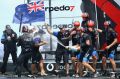 Emirates Team New Zealand helmed by Peter Burling celebrate after winning the America's Cup.