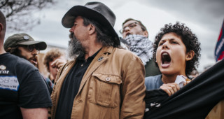 Tom Garrett supporters and protesters clashed outside his UVA town hall March 31.
Photo Eze Amos