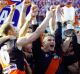 Bomber glory: Captain James Hird and coach Kevin Sheedy lift the 2000 AFL Premiership cup.