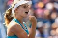 Daria Gavrilova of Australia reacts after winning a point during the first set against Dominika Cibulkova of Slovakia in ...