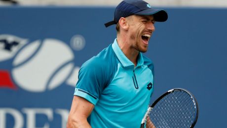 Last chance: John Millman reacts after losing a point to Philipp Kohlschreiber, who eventually beat the Australian.