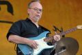 Walter Becker, of Steely Dan, performs during the 2007 Jazz and Heritage Festival in New Orleans. 