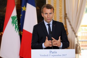 Emmanuel Macron speaks during a joint press conference at the Elysee Palace in Paris on Sept. 1, 2017