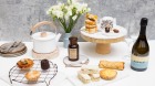 The ultimate high tea spread, complete with sparkling wine and Australia-grown loose leaf tea. 