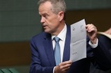 Leader of the Opposition Bill Shorten tables the renunciation of his British citizenship at Parliament House in Canberra ...