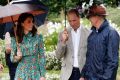 William and his wife Kate, Duchess of Cambridge are given a tour at the memorial garden in Kensington Palace.