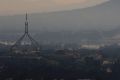 Smoke over Canberra on Wednesday morning due to the burn off at Kowen Forest. 