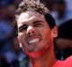 World No.1 Rafael Nadal celebrates after beating Alexandr Dolgopolov, of Ukraine.