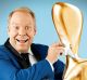 Channel 10 host Peter Helliar may have to trek all the way to the Gold Coast for next year's Logies. 