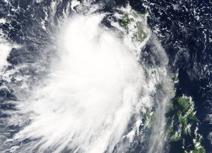 Tropical Storm Mujigae (22W) over the Philippines.