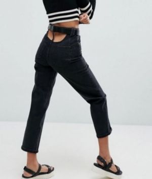 The jeans feature a semi-circle cut out, finished with a elongated belt loop slicing which is a little too reminiscent ...