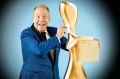 Channel 10 host Peter Helliar may have to trek all the way to the Gold Coast for next year's Logies. 