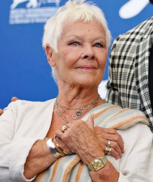 Judi Dench, left, and Ali Fazal pose during a photo call for the film Victoria And Abdul at the 74th Venice Film ...