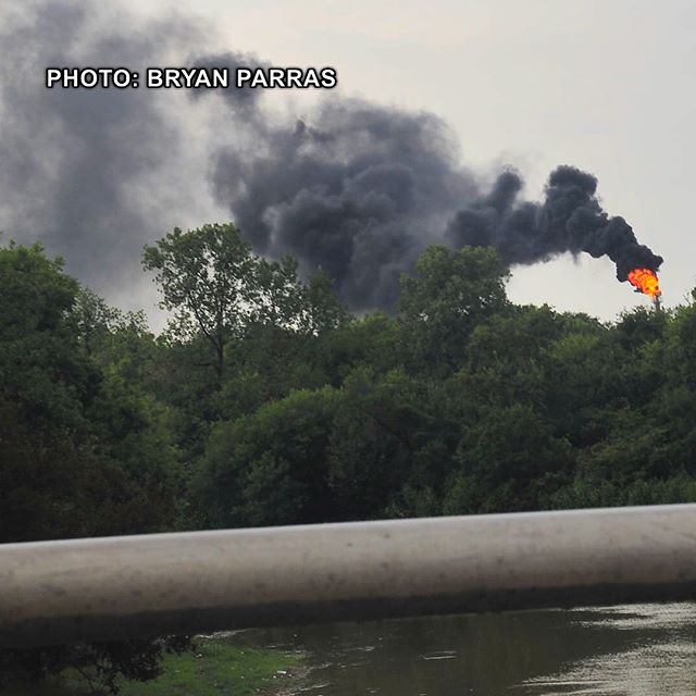 Residents of Houston reported smelling strong chemical odors late Friday night, and now environmental activists are warning of dangerous pollution in the wake of Hurricane Harvey. Houston environmental justice organizer Bryan Parras captured these photographs on Friday showing a flaring event at Texas Petrochemical (TPC) in Houston's East End, a predominately low income community of color. Houston is home to the largest refining and petrochemical complex in the United States. The photos also document vast piles of waste that are now underwater along Houston's ship channel. Parras is calling for the refineries to stop burning excess chemicals in flares. "You can see actually the black smoke, and that’s what we captured in the pictures and the video,” says Parras. "There is no reason why we should be having these flaring events that are literally gassing communities… That adds thousands of pounds of cancer-causing chemicals to the air." -- More coverage on today's show. Link in profile. #houston #harvey #hurricaneharvey #harvey2017 #weather #climatechange #flooding #pollution #toxic #dumping #refineries #oil #texas