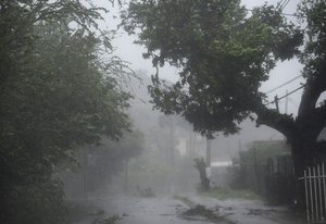 One of the streets of the Matelnillo community during the passage of hurricane Irma through the northeastern part of the island in Fajardo, Puerto Rico, Wednesday, September 6, 2017. The US territory was first to declare a state of emergency las Monday, as the National Hurricane Center forecast that the storm would strike the Island Wednesday. (AP Photo/Carlos Giusti)