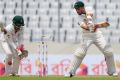 Small fish in a big pond: The Australian cricket team were beaten for the the first time by Bangladesh in a Test on ...