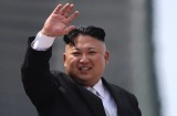 FILE-In this Saturday, April 15, 2017, file photo, North Korean leader Kim Jong Un waves during a military parade to ...
