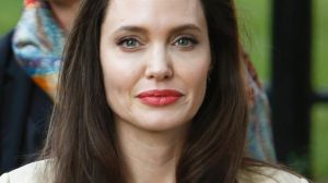 Angelina Jolie sits next to the British High Commissioner to Kenya Nic Hailey in Nairobi in June in her role as UNHCR ...