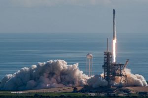 A SpaceX Falcon 9 rocket lifts off with the Pentagon's test vehicle attached.