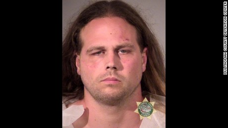 Portland stabbing suspect yells in court: Free speech or die